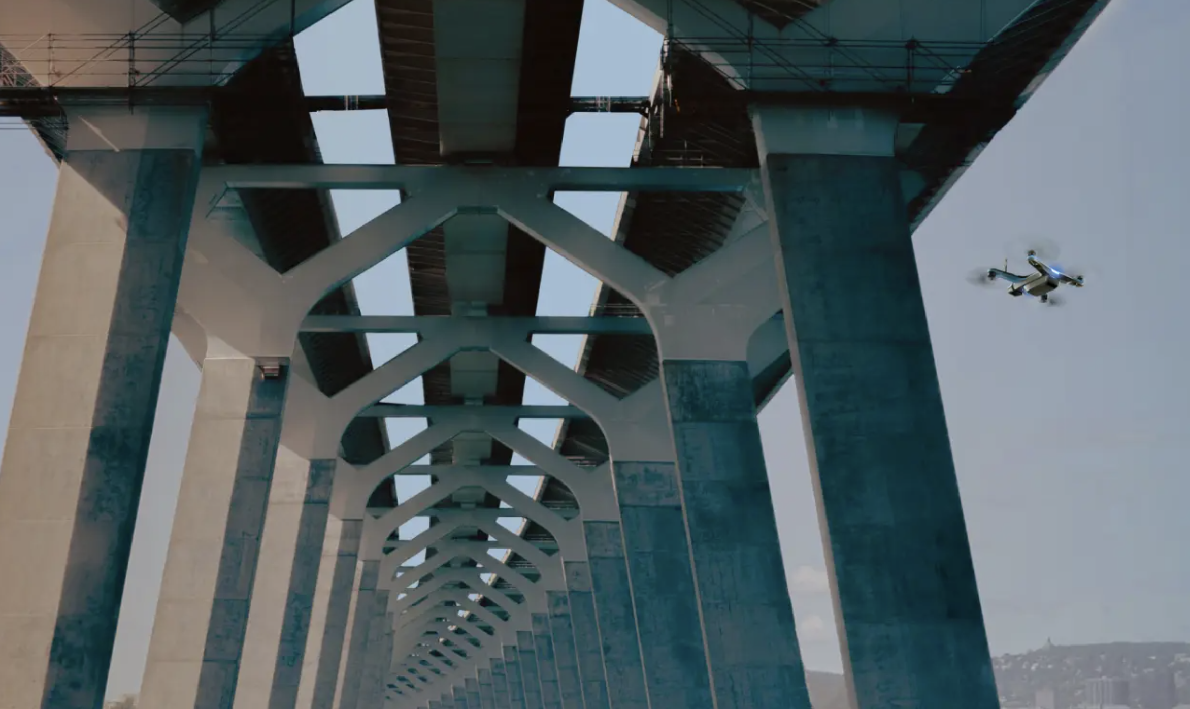 AI-powered drone inspecting a bridge